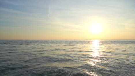 Golden-Hour-Sunlight-Above-Horizon-of-Tropical-Sea