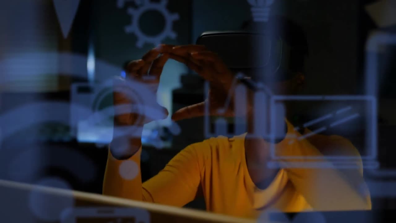 Blue digital icons floating against african american businesswoman wearing vr headset at home