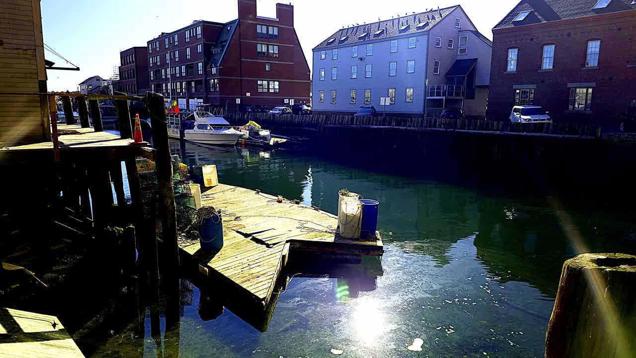 Tranquil Harbor Scene: Weathered Dock and Calm Waters