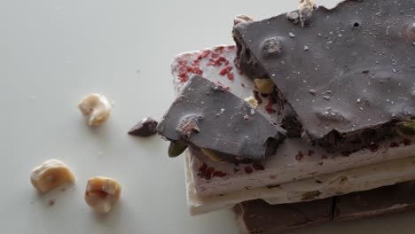 assortment of gourmet chocolates with hazelnuts and pistachios