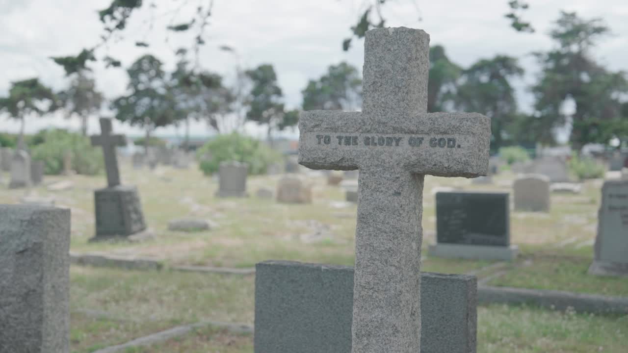 Crucifix tombstone in a graveyard in Cape Town, South Africa