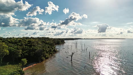 A-mesmerizing-hyperlapse-journey-along-the-stunning-coast-of-the-Paraná-River,-with-the-radiant-sun-as-a-breathtaking-backdrop