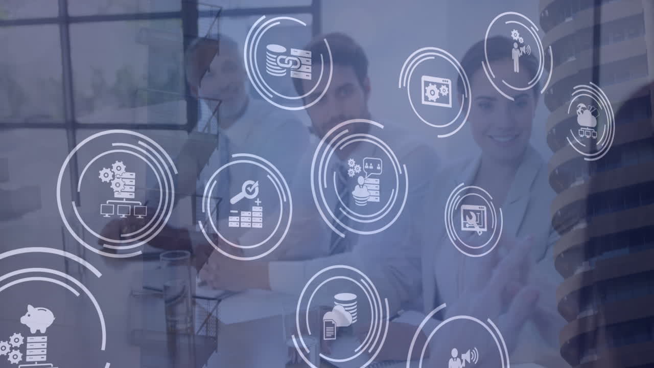 animación de iconos de la tecnología sobre empresarios caucásicos en la oficina