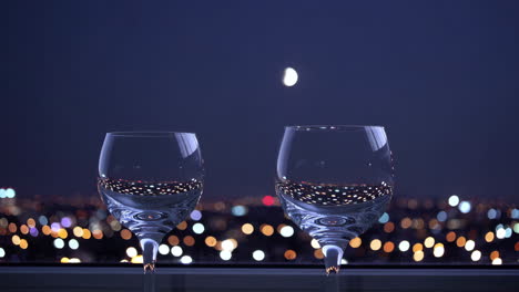 romantic night view with wine glasses