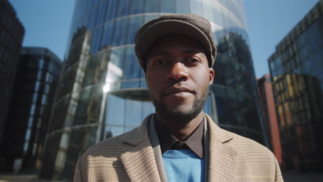 portrait of young african american businessman in downtown