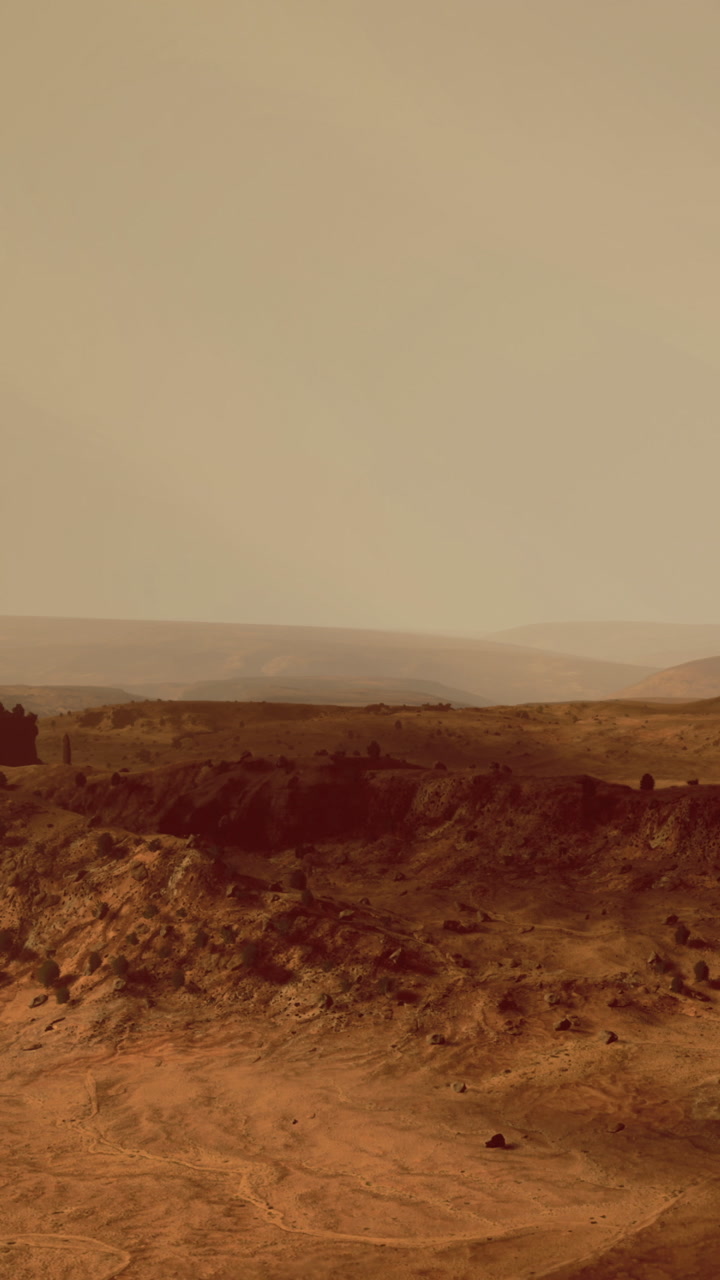 Landscape view of rocky terrain with distant hills during daytime