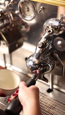 barista making coffee