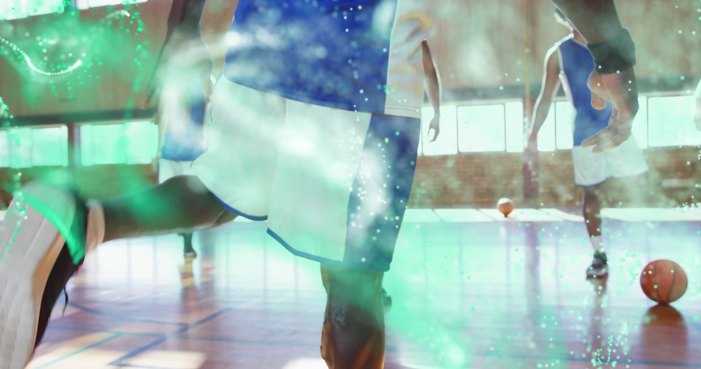 Prosthetic-leg basketball player dribbling and forming green digital trails during sports training