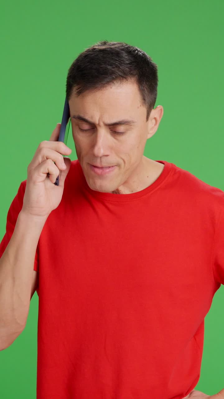 Man talking on the phone in a hurry