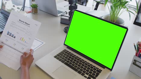 African-american-businesswoman-using-laptop-for-video-call-with-copy-space