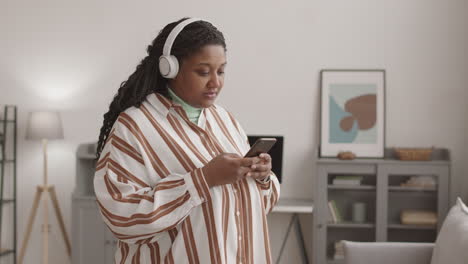 african-american woman listening to music