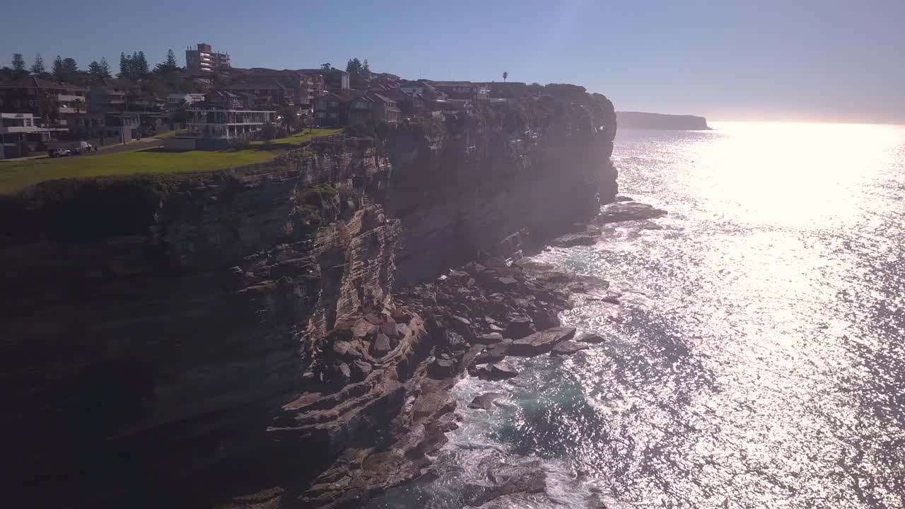 Drone footage of towering ocean cliffs in Sydney Australia
