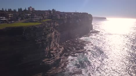 Drone-footage-of-towering-ocean-cliffs-in-Sydney-Australia
