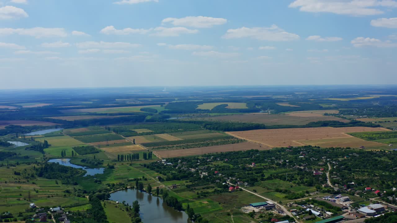 Aerial view of green countryside. Aerial view of residential area in rural town