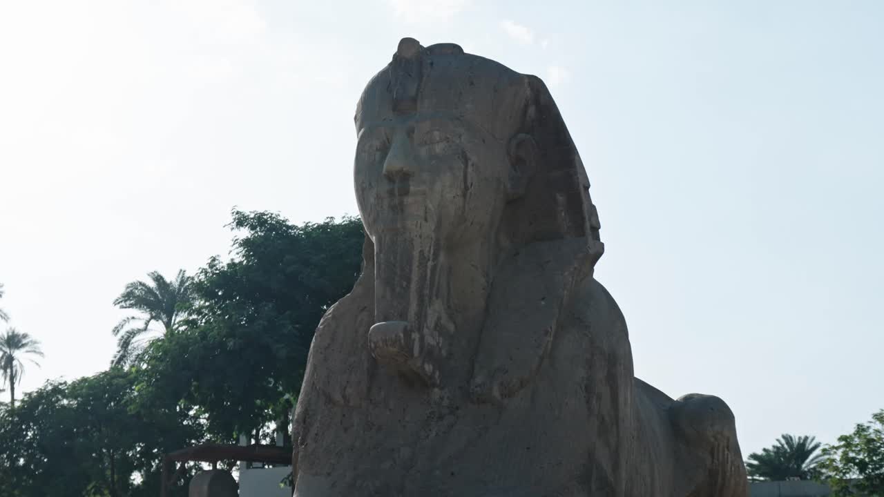 Alabaster Sphinx housed in its own shelter within the Memphis Open-Air Museum. At approximately 4 meters (13 feet) long and weighing 80 tons