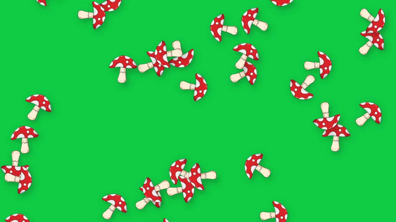 Animated Red and White Mushrooms Falling on Green Screen