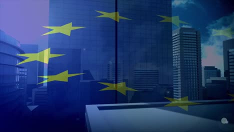 Zusammengesetztes-Video-Einer-Flagge-Der-Europäischen-Union,-Die-Gegen-Hohe-Gebäude-Weht
