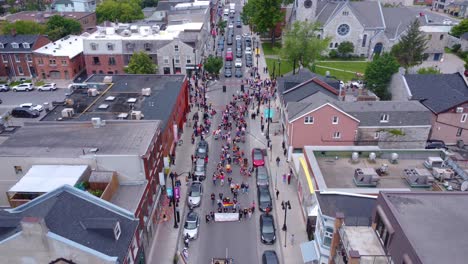 aerial of people celebrating pride day with a parade