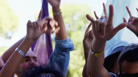 group of friends dancing at music festival 4k