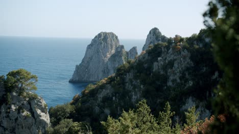 Beautiful-view-of-the-Faraglioni,-in-Capri,-from-an-unexpected-point-during-a-sunny-day-in-spring