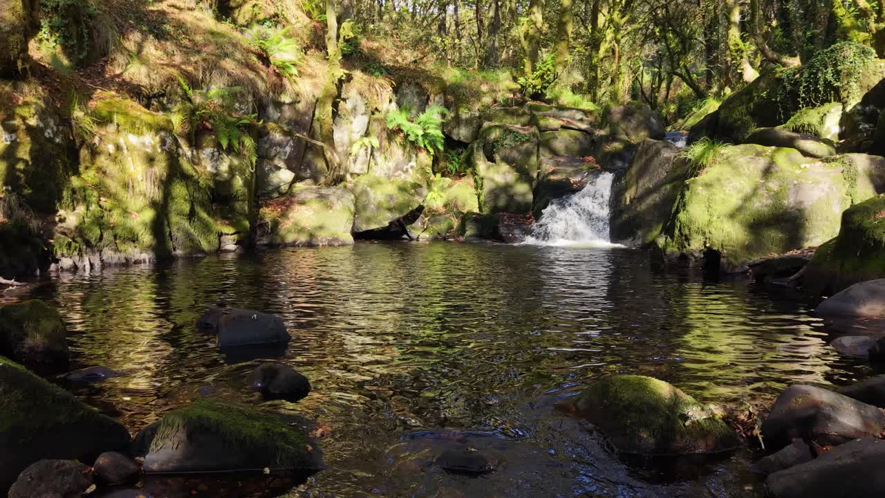 Rocky River And Fervenza de Fírvado (Firvado Waterfall) In Galicia, Spain. Aerial Forward Shot