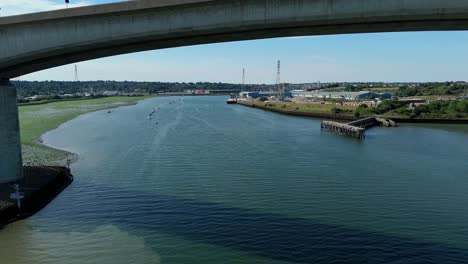 cinematic aerial footage of orwell bridge crossing the river in ipswich england