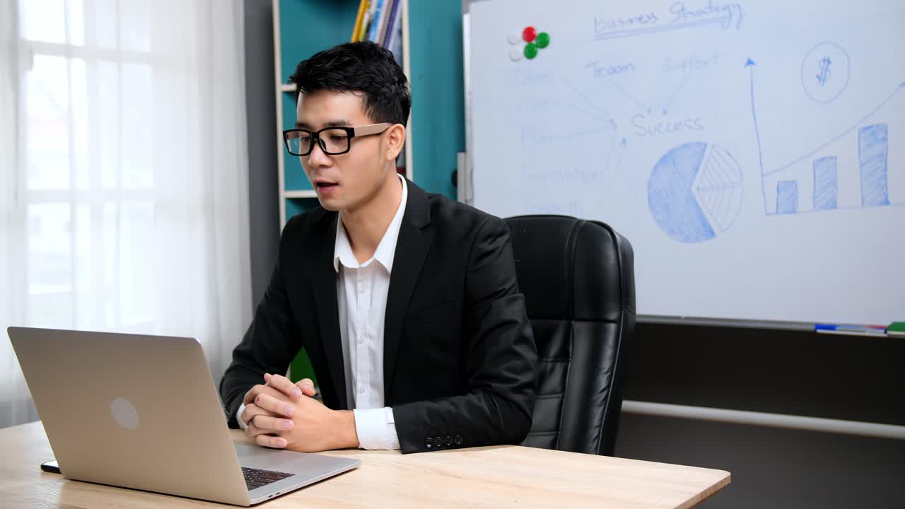 Asian Businessman Having Video Conference