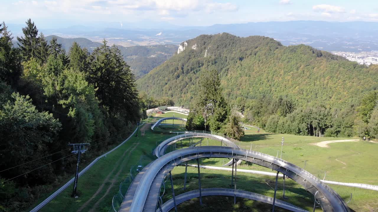 Drone flight over Slovenian bob kart track, Celjska koča. Aerial