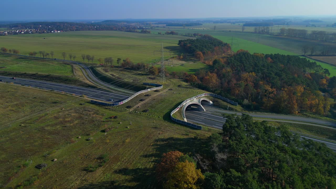 Wildlife crossings Ecoduct, ecopassage, nature ecopassage or green bridge, game changeover. highway in Germany Infrastructure for animals. Perfect aerial view flight panorama overview drone