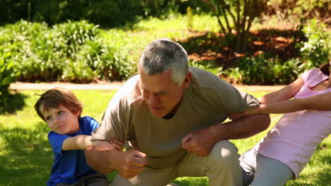 Grandfather-playing-with-his-grandchildren