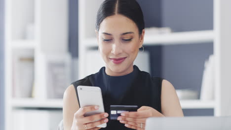 a-young-businesswoman-using-a-cellphone