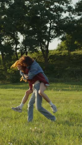 couple playing in a field