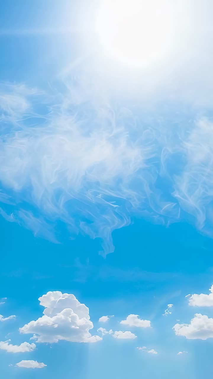 Vertical video: At start sun streaming rays through cirrus and puffy cumulus clouds shifting in sky