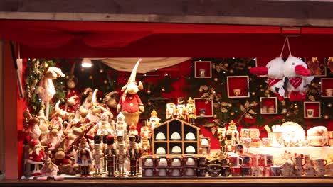 christmas shopping at festive christmas market in strasbourg, france europe