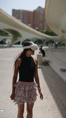 woman experiencing vr in a modern city