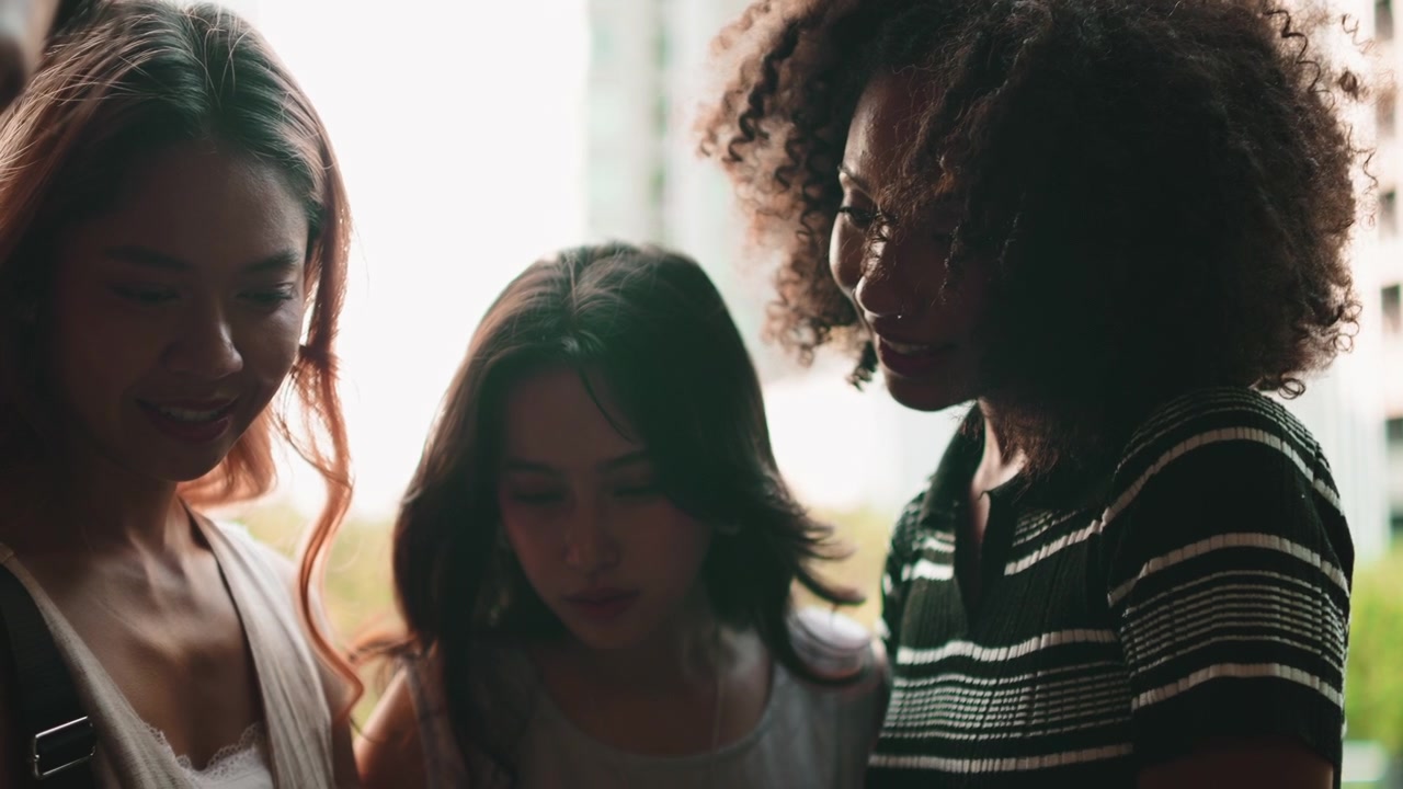Diverse Group of Young Women Collaborating Together