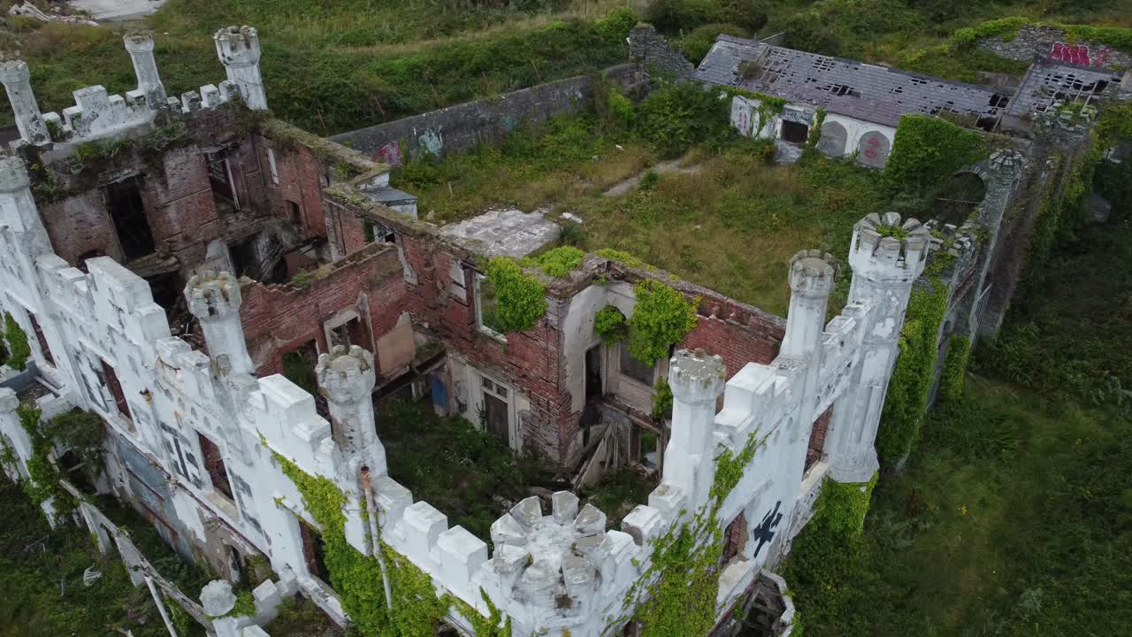 Soldiers point house aerial view abandoned empty shell of ivy covered Victorian mansion castle hotel