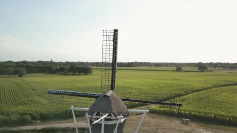 dutch windmill and farmland landscape