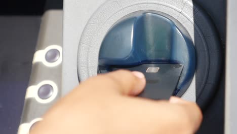 person using an atm