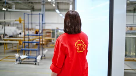 interior of manufacturing factory. rear view of workers at manufacturing workshop