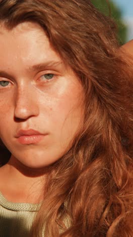 close-up portrait of a woman in sunlight