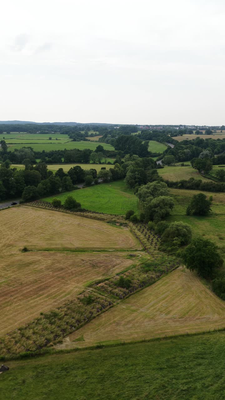 Aerial drone views of the Siegfried Line’s “dragon’s teeth” anti‑tank obstacles, focused on their WW II memorial