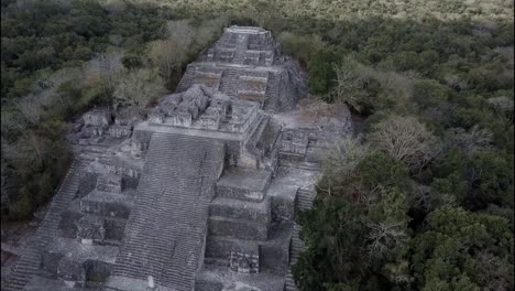 beautiful aerial flying around the mayan calakmul temple in the mexican yucatan