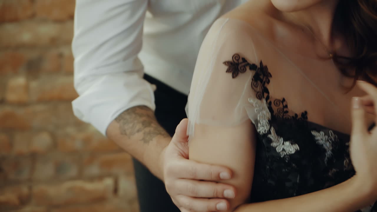 Couple in the restaurant. Young woman with her man sitting in the restaurant