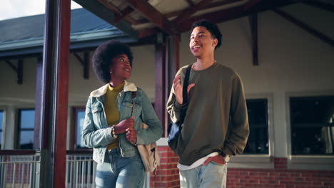 two young people walking and talking