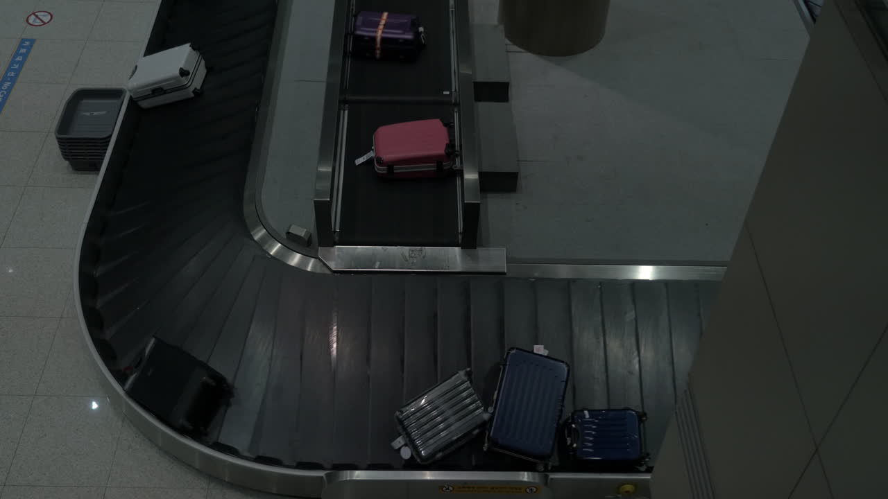 Baggage arriving to conveyor belt in the airport
