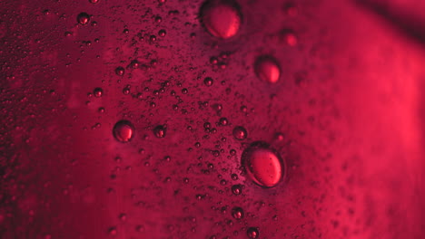 red abstract bubbles rising in liquid