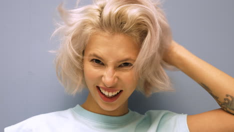 happy woman with short blonde hair