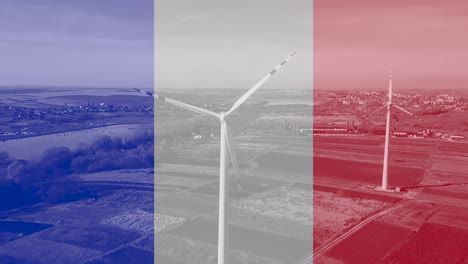 wind energy farm against the background of the france flag