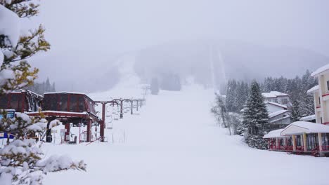 beautiful empty ski field and chair lift in the mountains with no people